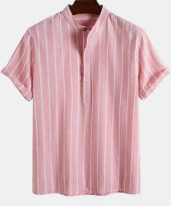 Loose fit blue polo shirt with a printed letter design on the chest, featuring short sleeves.