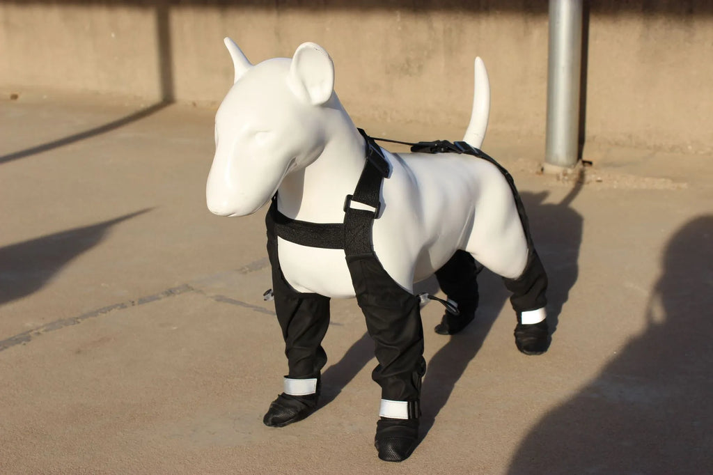 Black dog paw protectors with adjustable Velcro straps, waterproof non-slip soles