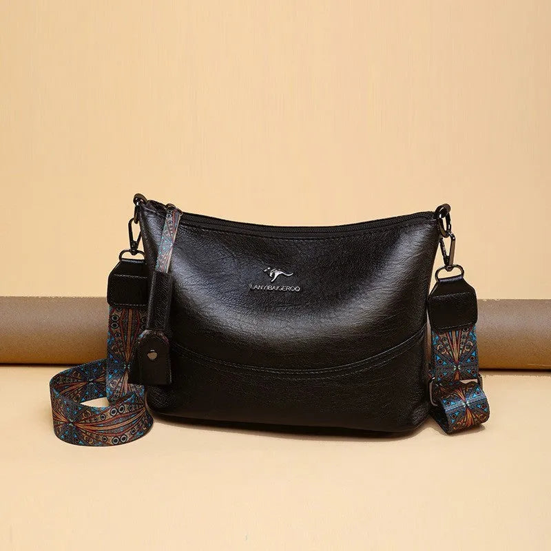 Women's bucket bag in PU leather, crossbody style, outer pocket, black colour, horizontal square shape