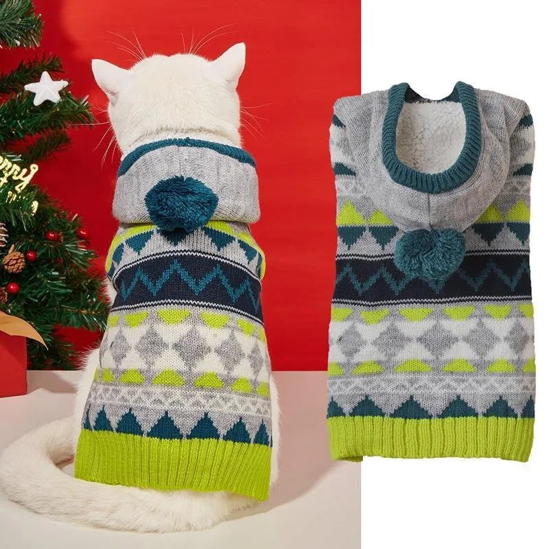 Green acrylic pet sweater with a diamond knit pattern for a small dog.