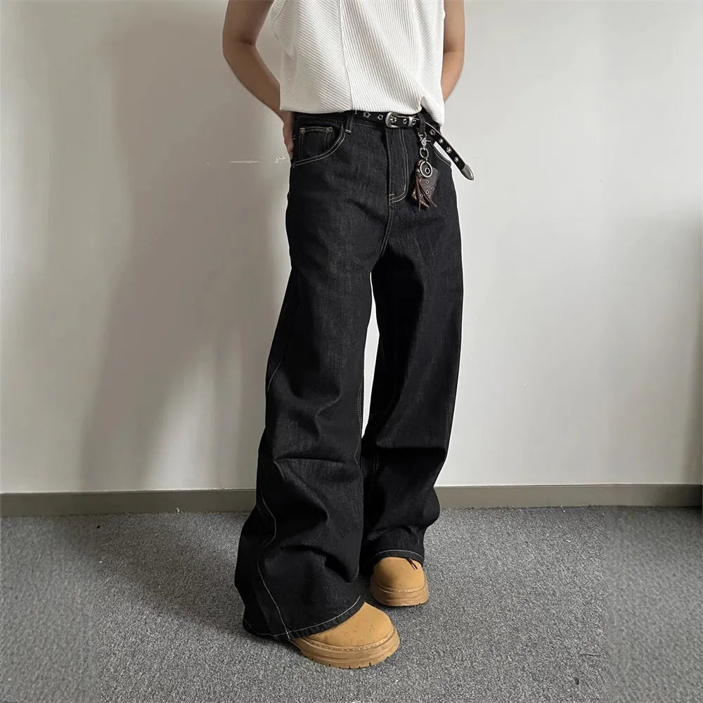 Black retro straight-leg jeans with wide-leg design on hanger