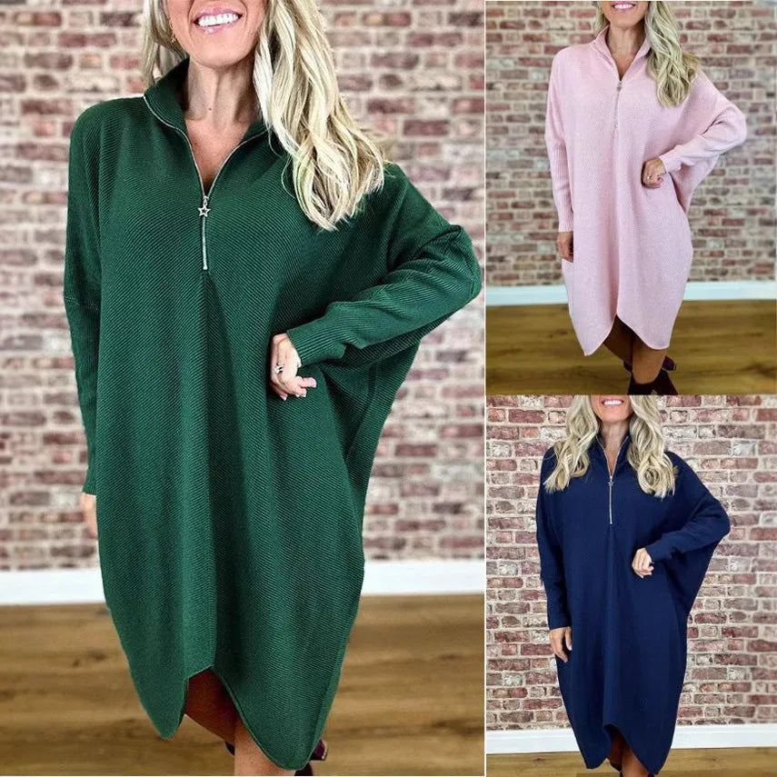 Women's solid colour knitted loose dress with raglan sleeves and a front zip.