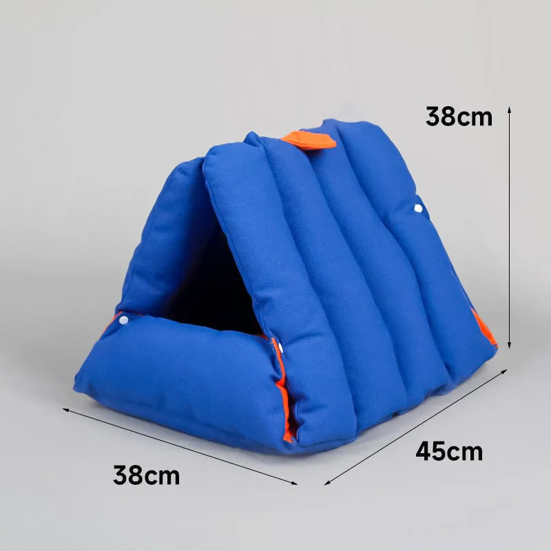 Triangular blue cotton cat nest with drilled holes for deforming, 45x38x38cm, on a wooden floor