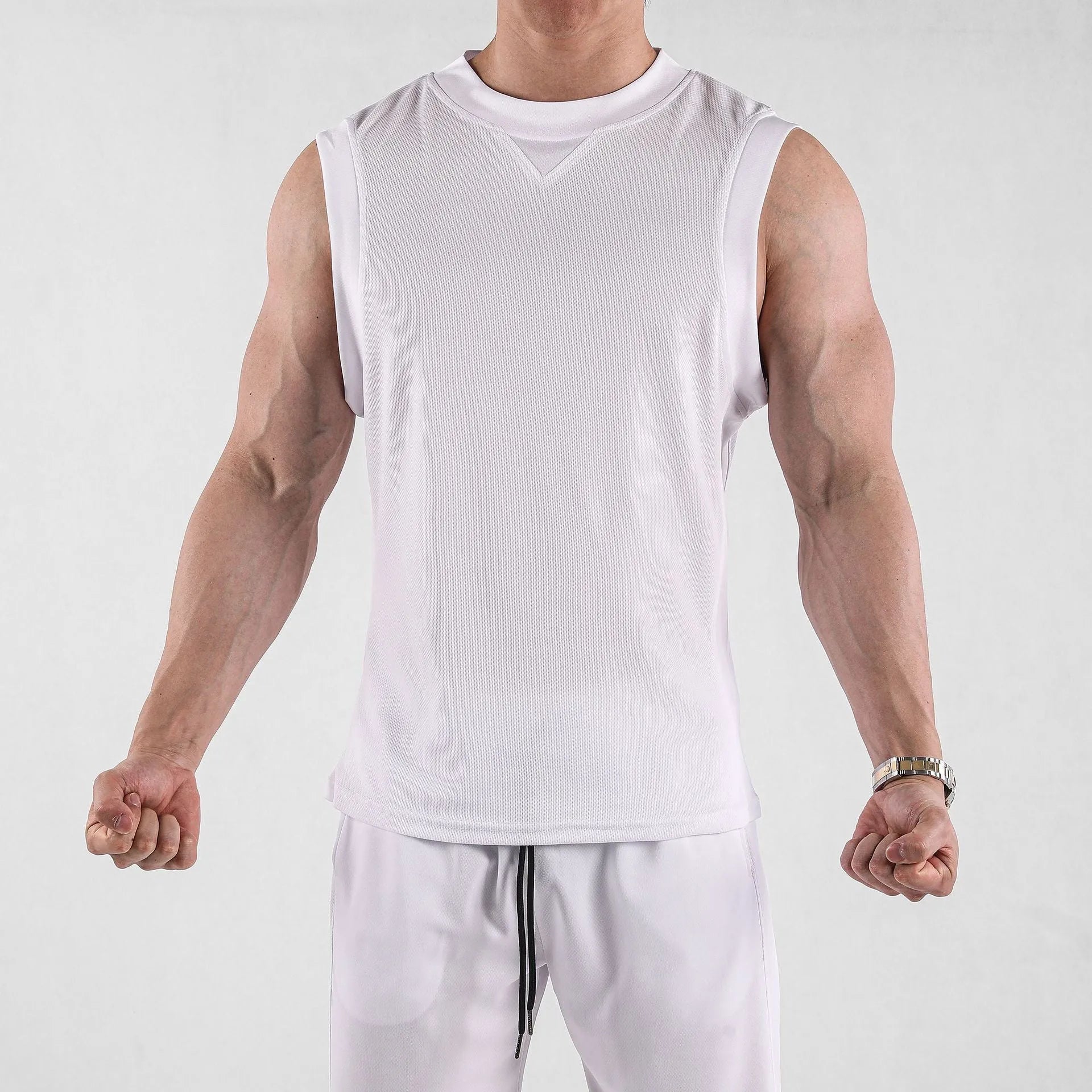 Men's loose fit fitness vest in white or black with quick-dry breathable fabric for summer sports