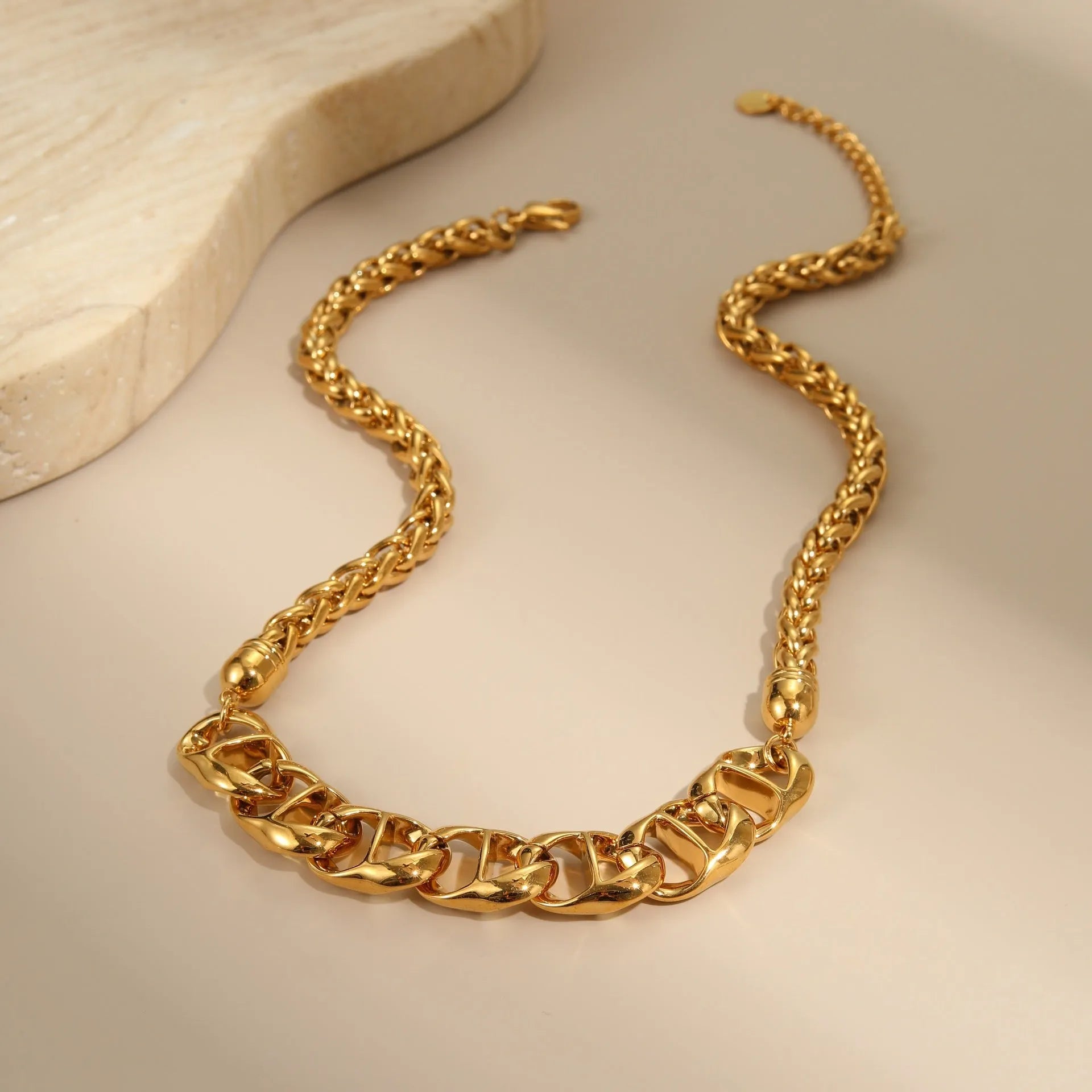 Stainless steel women's necklace with geometric pendant and gold plating