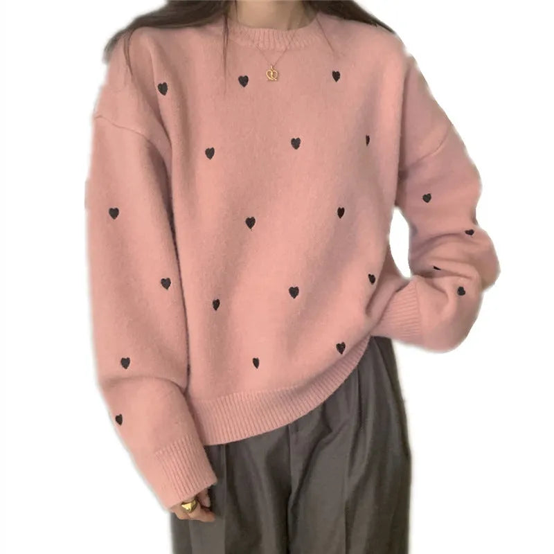 Women's loose fit acrylic pullover sweater with crew neck and embroidery details