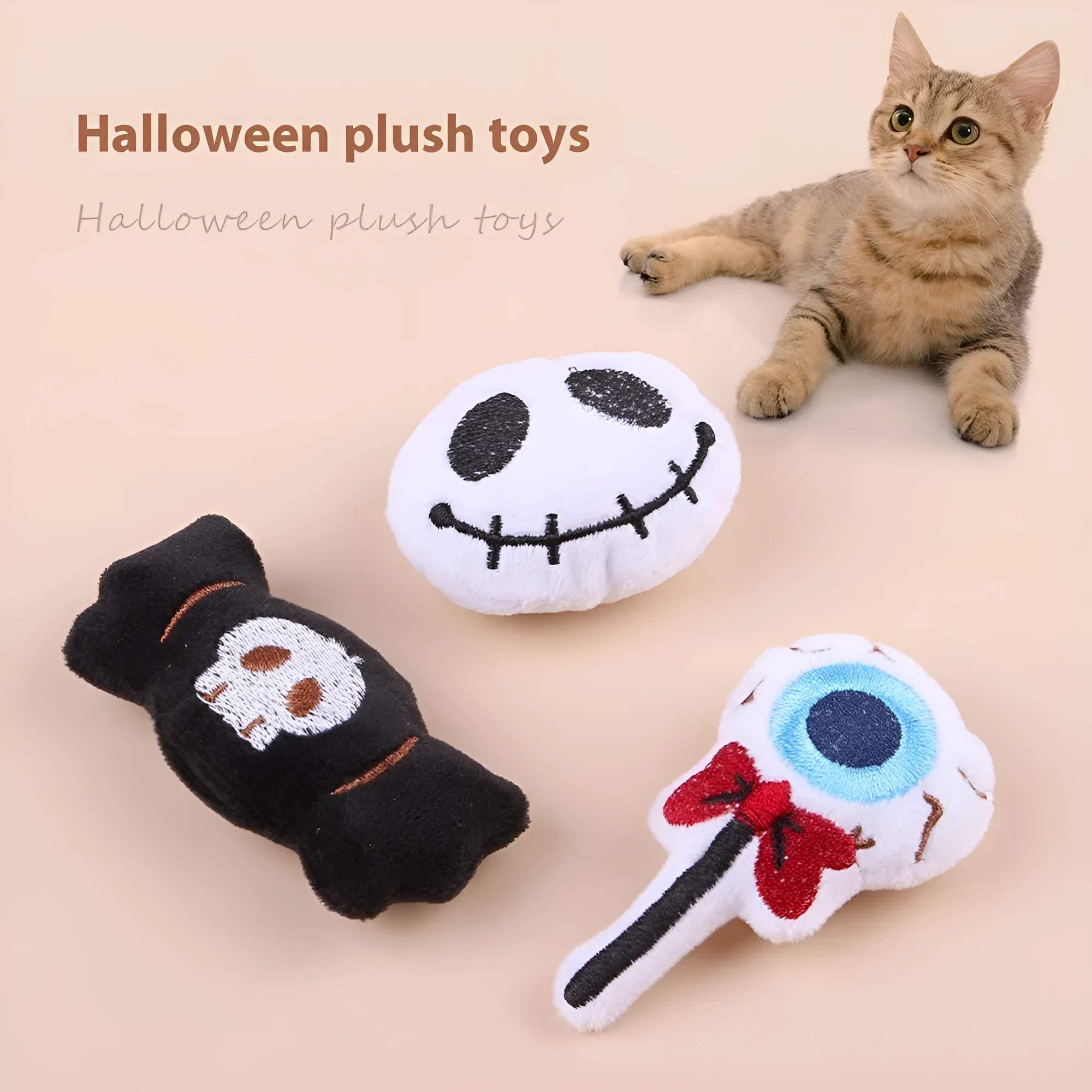 Plush cat teaser wand toy with colourful candy and skull designs on small attachment