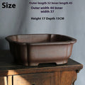 A modern rectangular flower pot made from purple sand ceramic, standing on a floor.