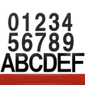 Black stainless steel adhesive-backed house number or letter, 7.5cm tall, for outdoor door or wall.