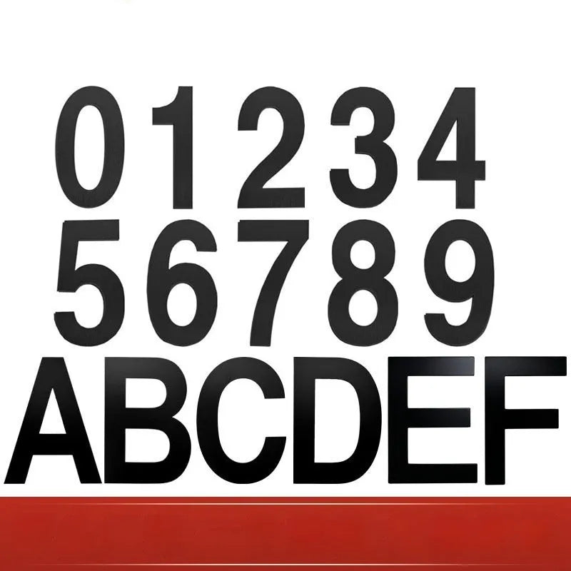 Black stainless steel adhesive-backed house number or letter, 7.5cm tall, for outdoor door or wall.