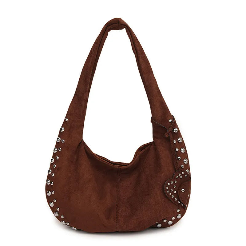 Soft plush strapless tote handbag in a retro style, shown in multiple colour options.