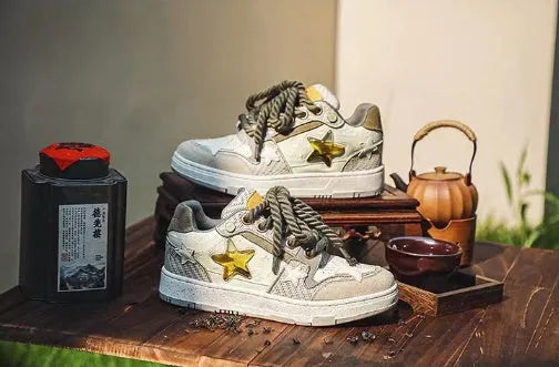Green low-top China-Chic Star casual shoes with stitched pattern and rubber sole.