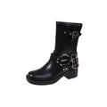Black platform calf-length women's boots with a large decorative buckle on the shaft.