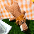 Corn kernel shaped plush dog chew toy with animal designs and squeaker sound feature