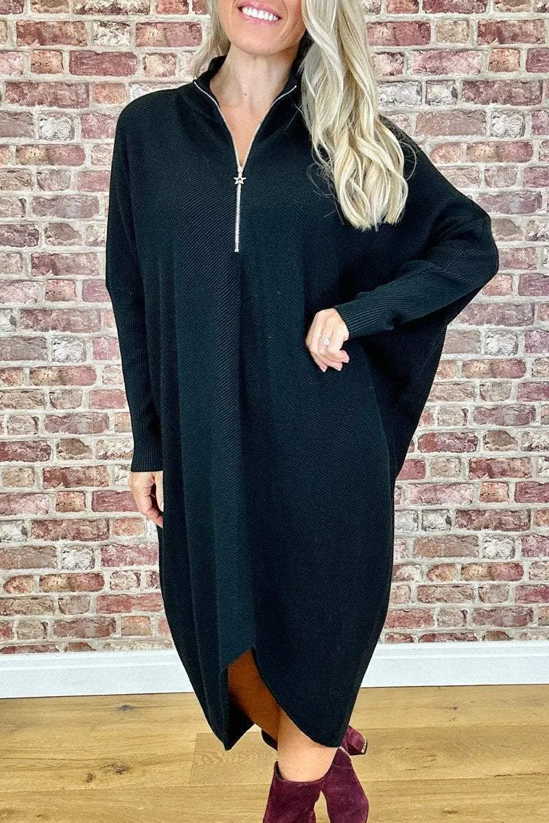 Women's solid colour knitted loose dress with raglan sleeves and a front zip.