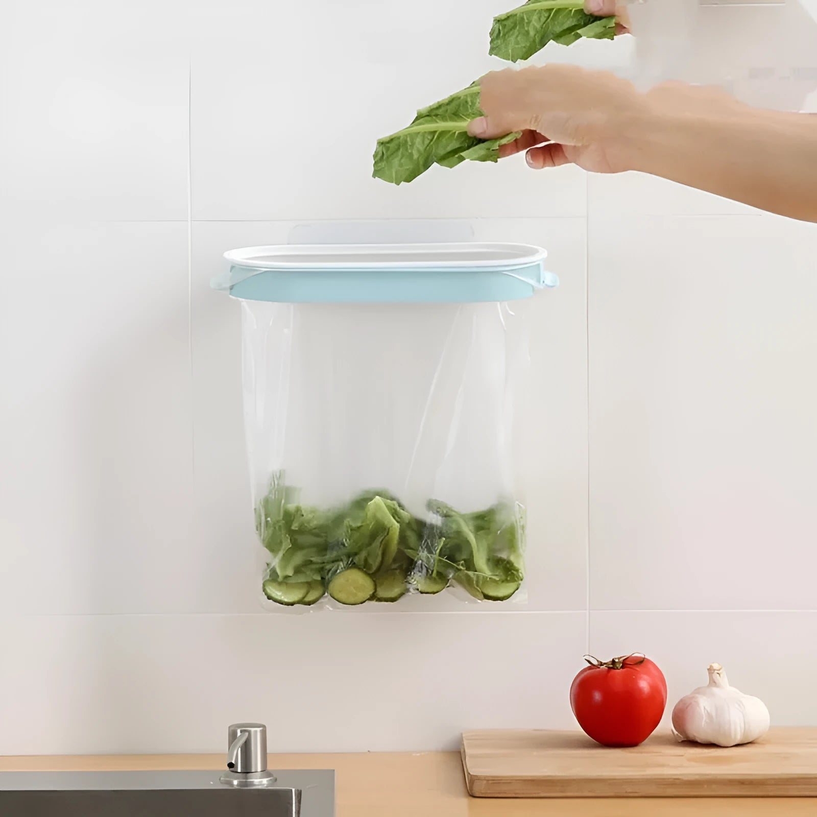 Blue plastic kitchen garbage bag storage rack with compact dimensions for cabinet organisation