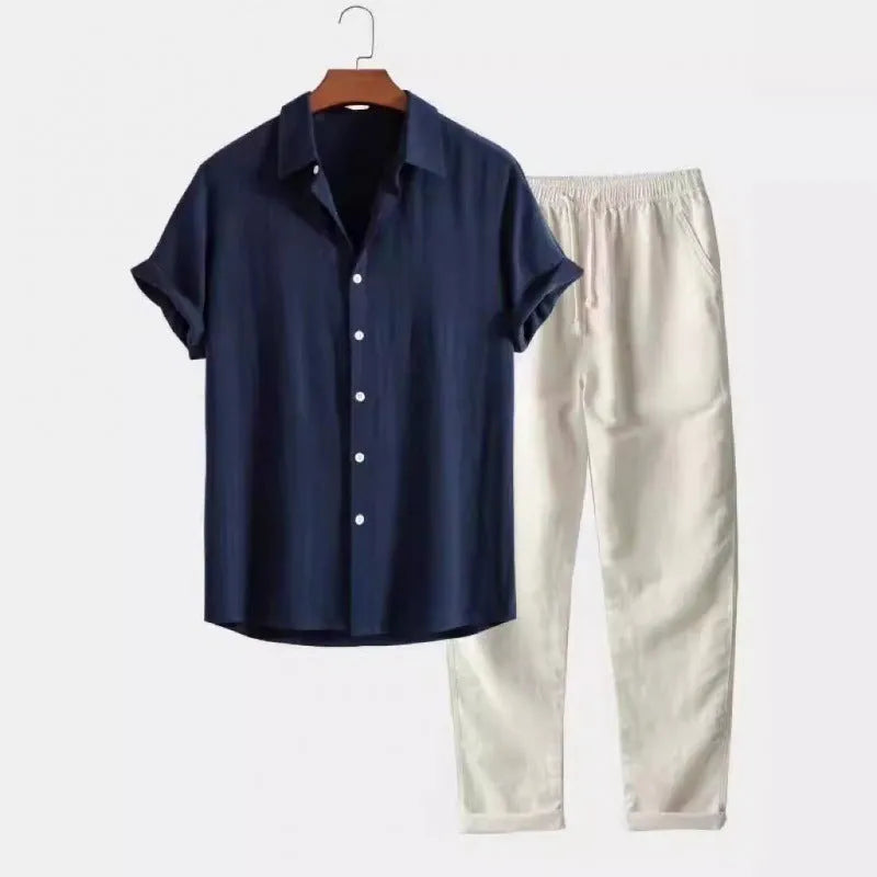 Men's loose fitting short sleeve shirt and trousers suit in linen-look polyester fabric on hanger