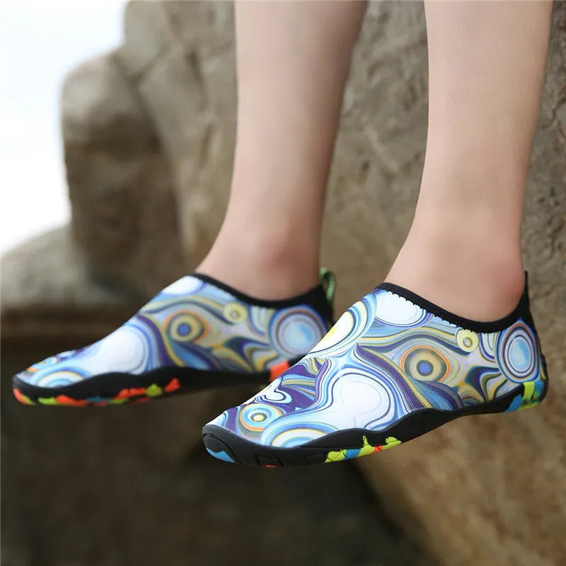 Beach wading shoes with elastic Lycra uppers and EVA foam soles for swimming and water sports