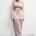 Women's long sleeve printed chiffon dress set with high waist skirt and matching top.