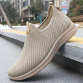 Spring men's breathable flyknit casual shoes in black with rubber sole – side view for hiking and daily wear