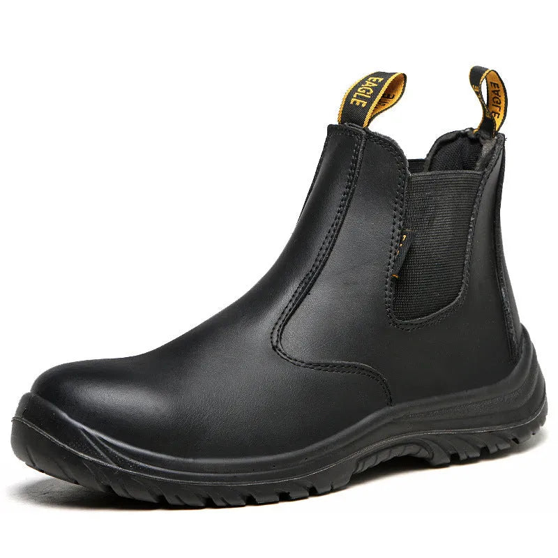 Black high-top leather safety work boots with anti-piercing sole on a workbench.
