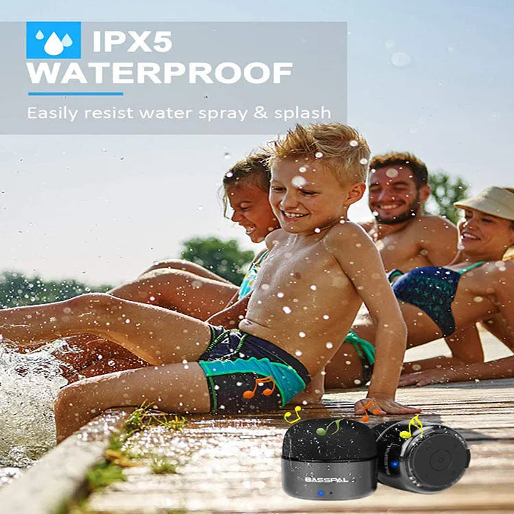 Black portable mini Bluetooth speaker with waterproof plastic housing and control buttons