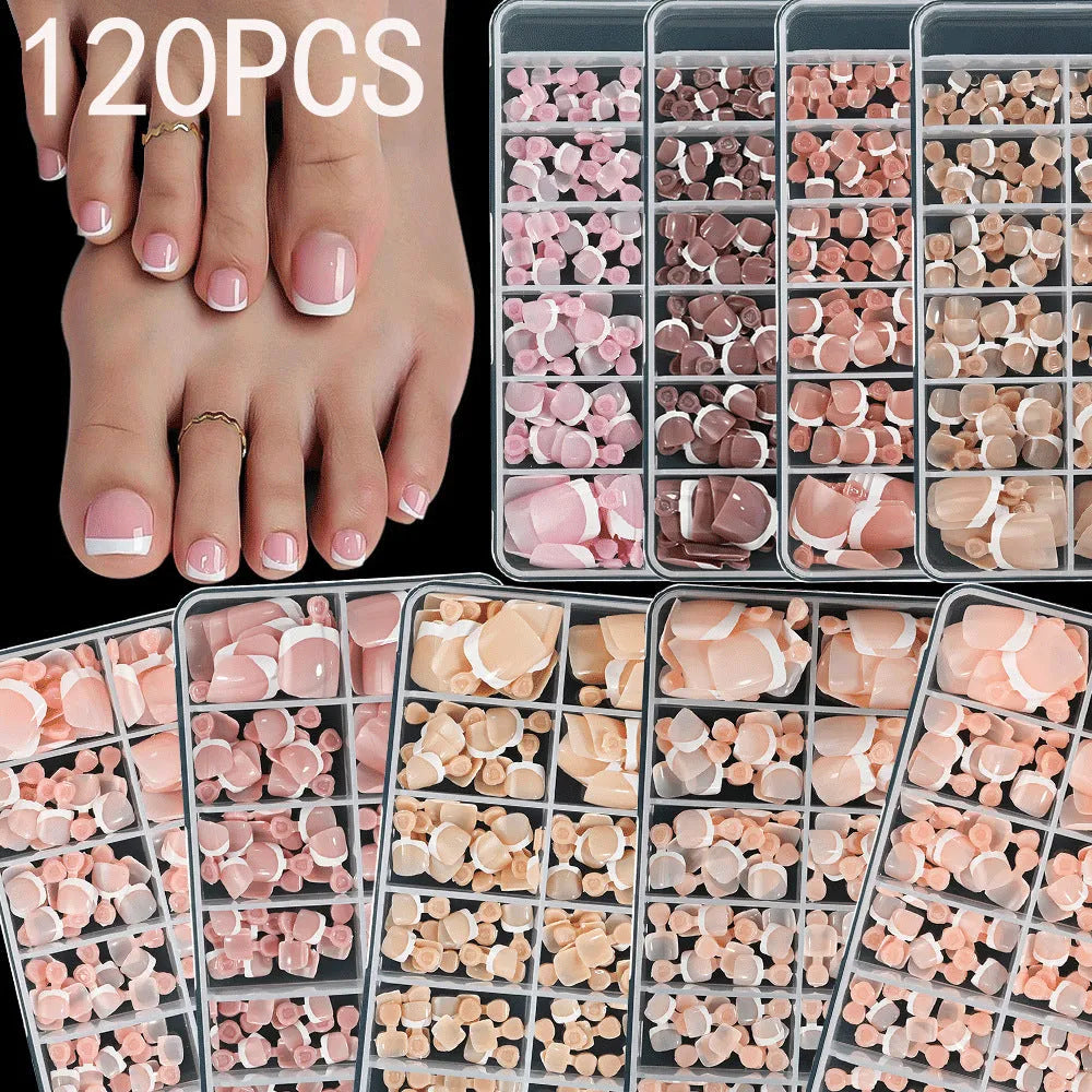Open box showing 120 full square short French white edge toe nail tips in various nude shades.