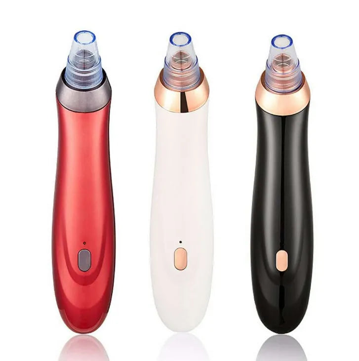 Electric blackhead remover device with multiple nozzle attachments for pore cleaning