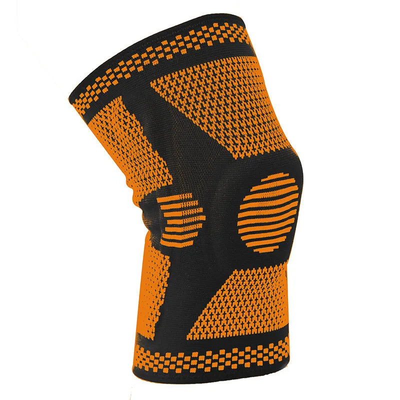 Close-up of a polyamide sports knee pad with a visible silicone spring, shown in blue.