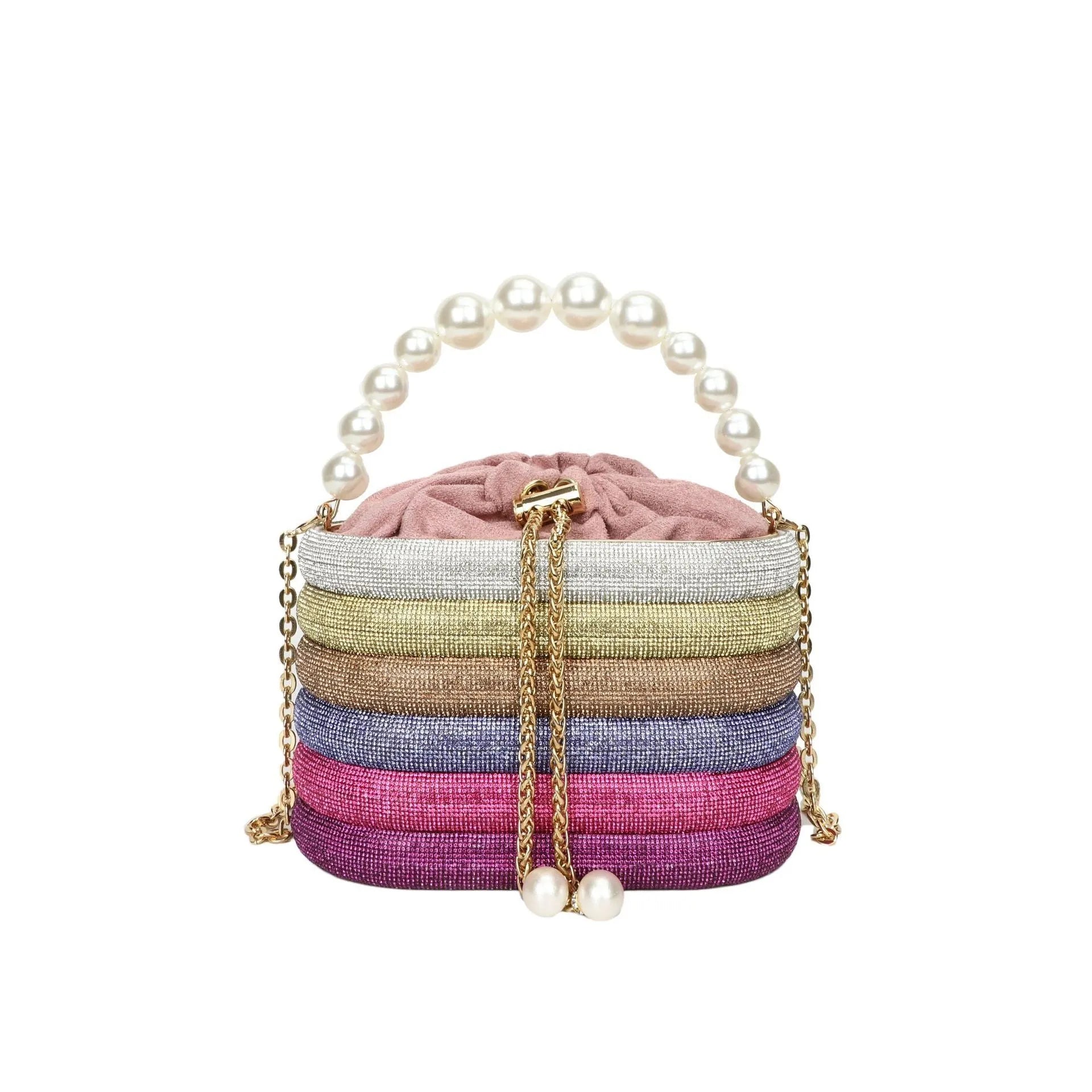 Women's retro style crossbody bag with beaded pearl detail on soft PU material in rounded suitcase shape