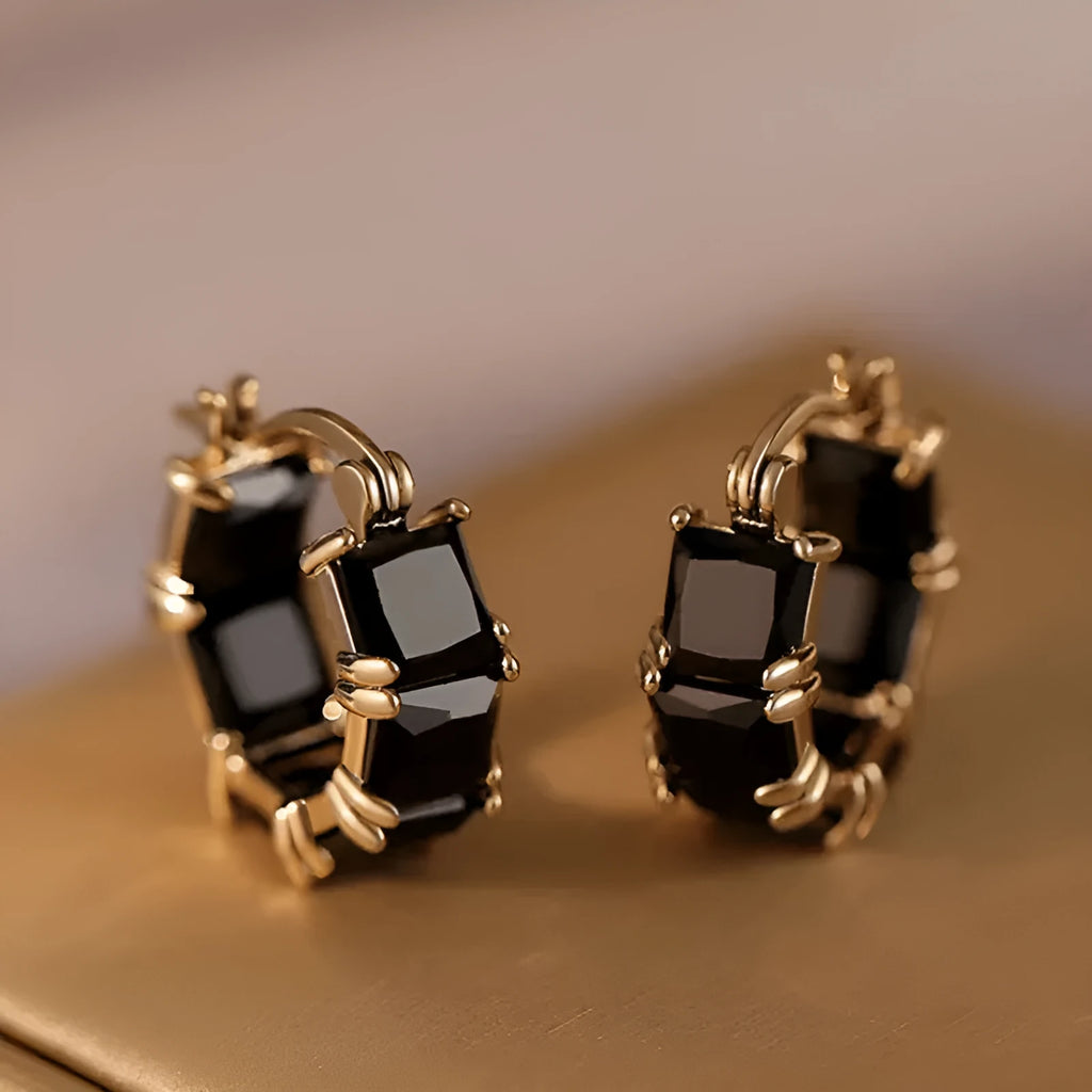 Geometric U-shape women's earrings with round black zircon crystals in gold electroplated settings