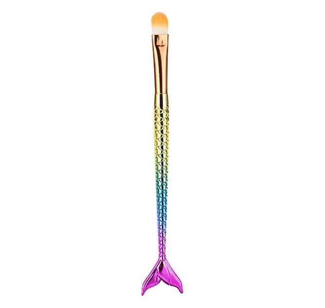 10 mermaid makeup brushes with multicolour nylon bristles and plastic handles laid flat