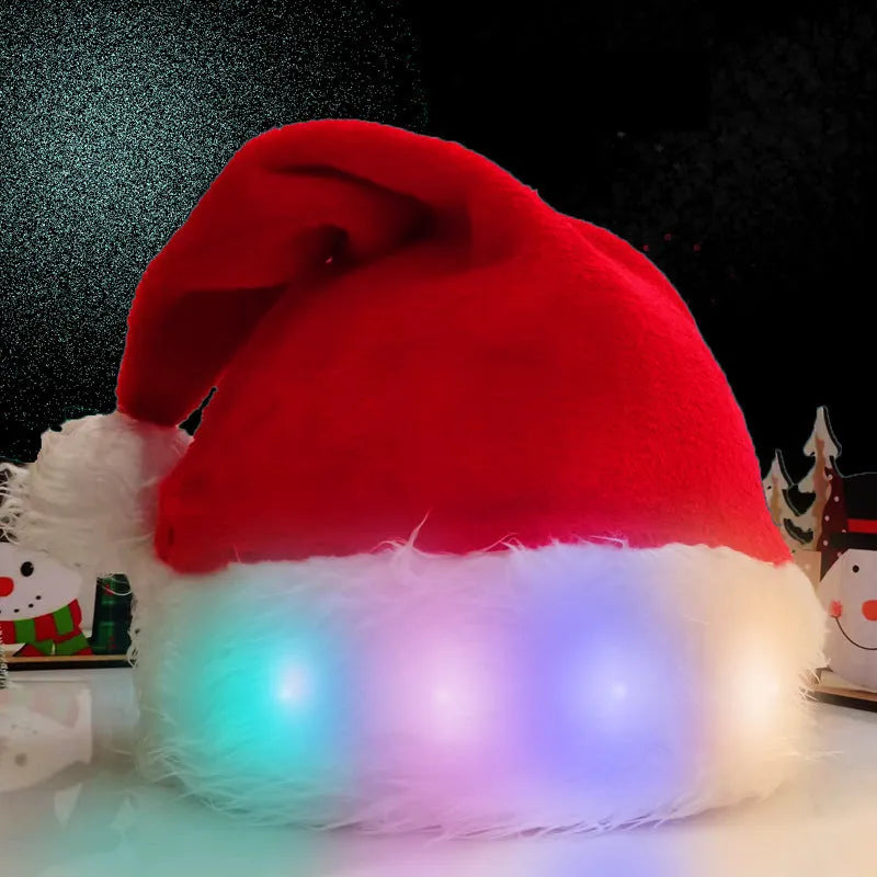 Red and white plush Santa hat with integrated twinkling LED lights and a white pom-pom.