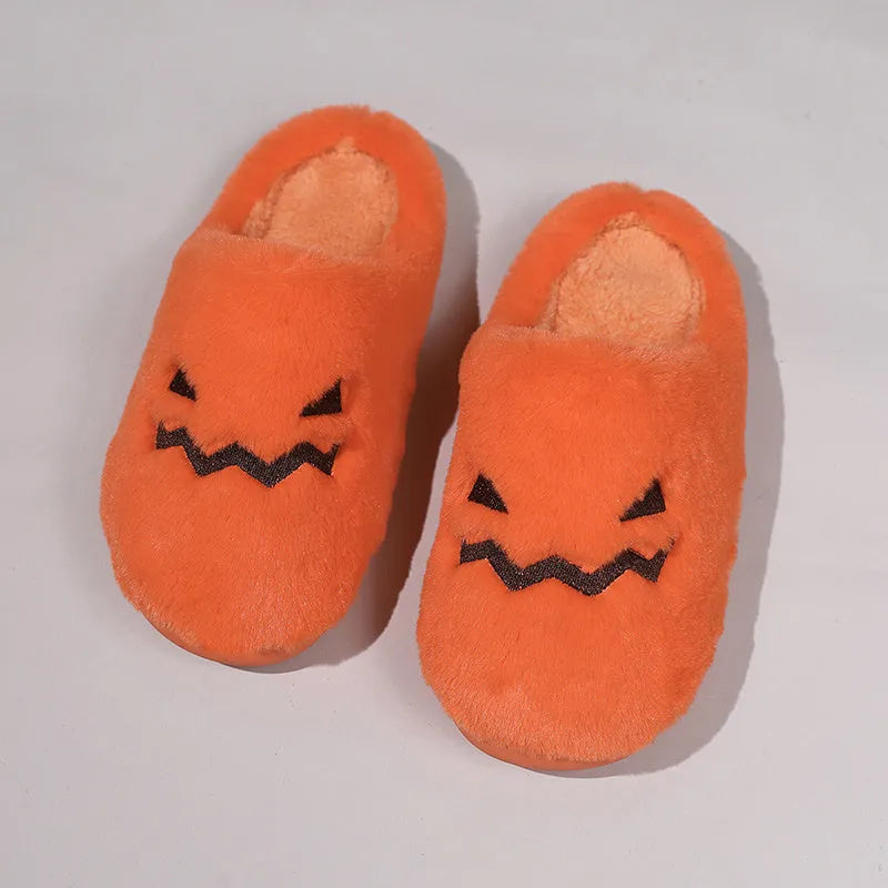 Orange Halloween pumpkin design plush slippers with coral velvet upper and flat PVC soles