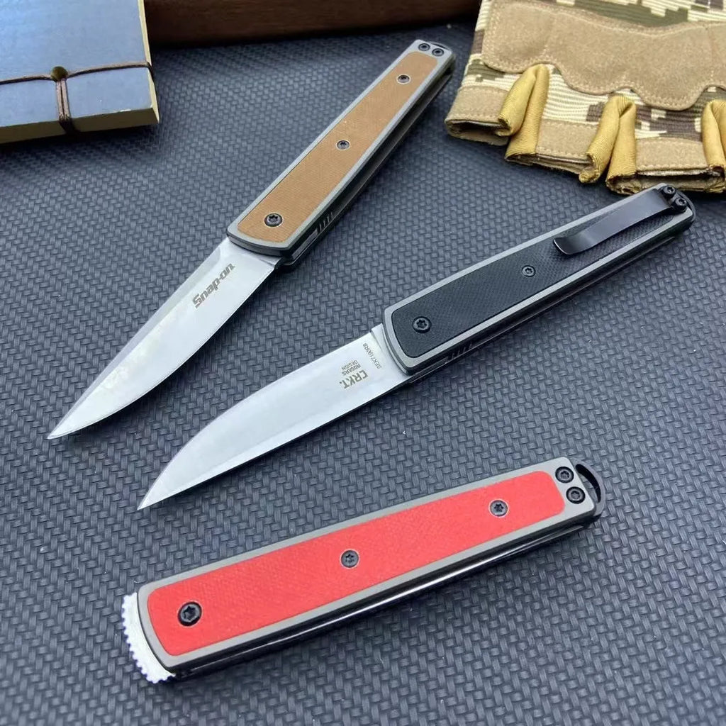 CRKT 7190 folding fruit knife showing blade and handle in choice of black, coffee brown, or red colours