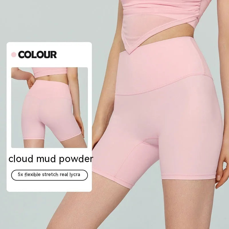 Women's high-waist Lycra yoga shorts in leaf green, short length for cycling and exercise.