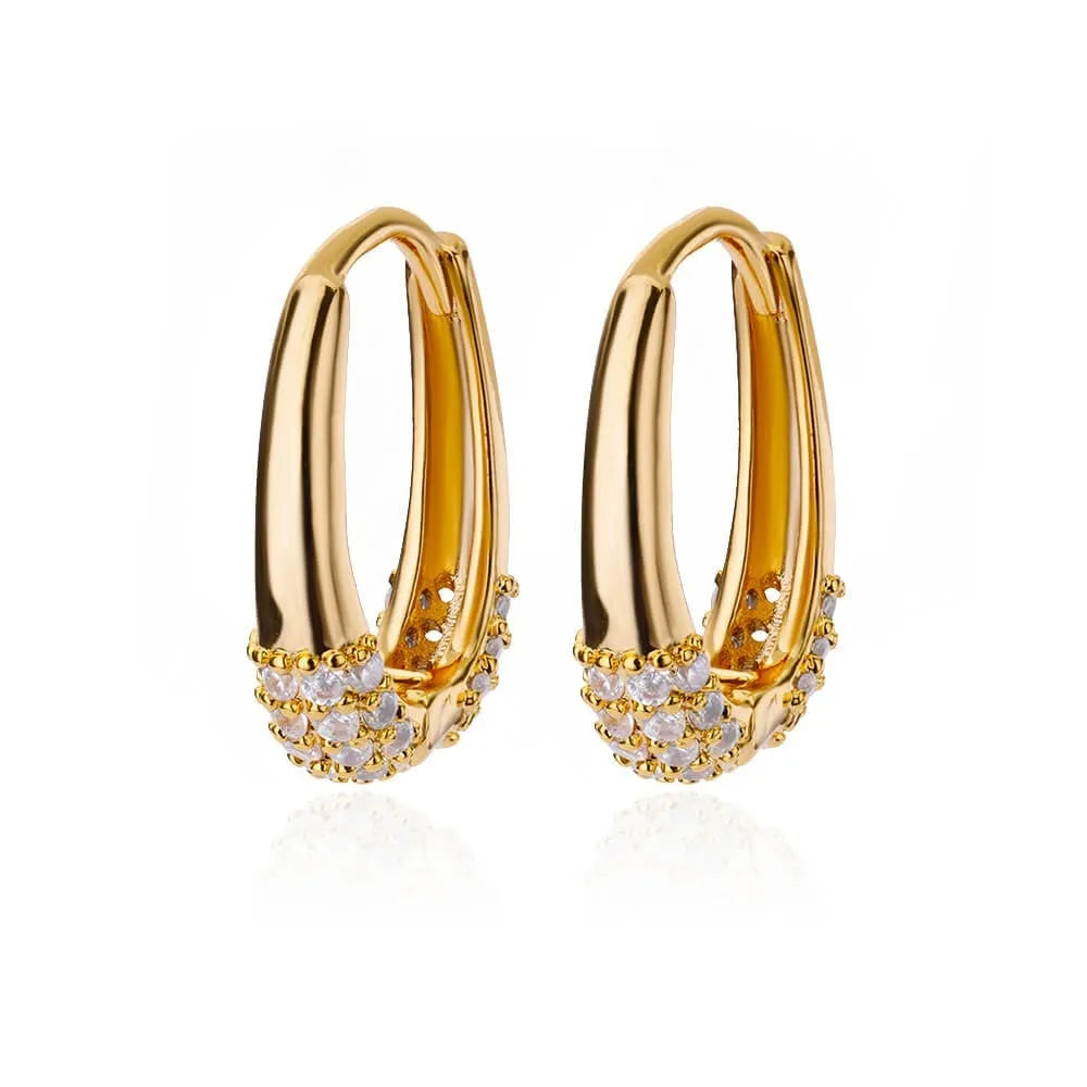 Geometric butterfly-shaped copper earrings for women with heart and star design details.