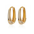 Geometric butterfly-shaped copper earrings for women with heart and star design details.