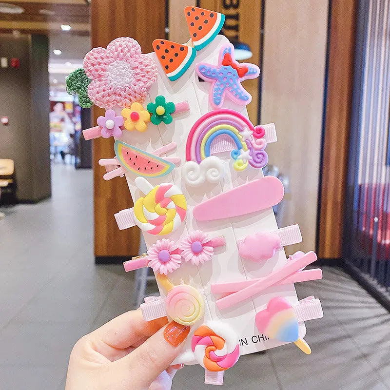 14-piece toddler hair accessories set: colourful rainbow, fruit, and butterfly barrettes in soft silicone clay.