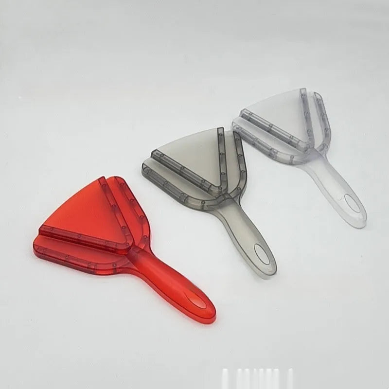 Telescopic red plastic can and bottle opener with adjustable length handle on a kitchen worktop.