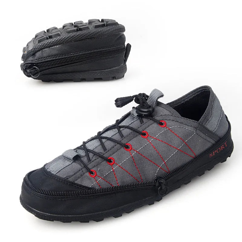 Orange foldable river trekking shoes with mesh upper and side zipper, shown compressed for storage.