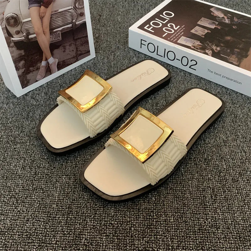 Women's apricot-coloured casual flat slippers with a textured PVC sole.