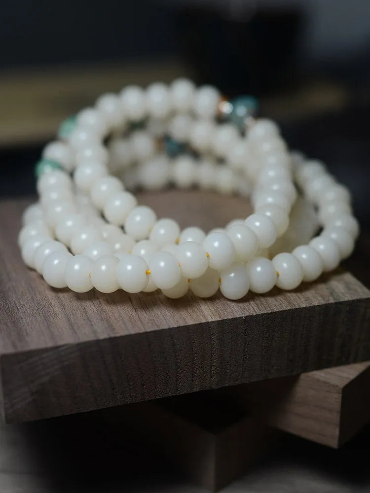 White Jade Bodhi Root Oblate Bead Bracelet with 108 natural bodhi seeds beads in 7x9mm and 8x10mm sizes