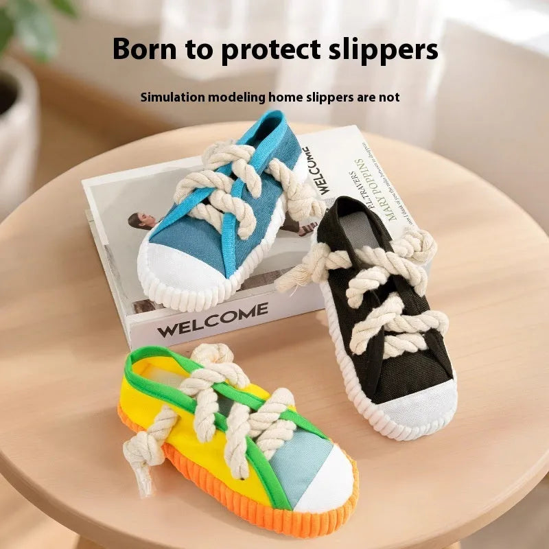 Plastic dog chew toy shaped like a slipper in yellow, black, and blue colour options.