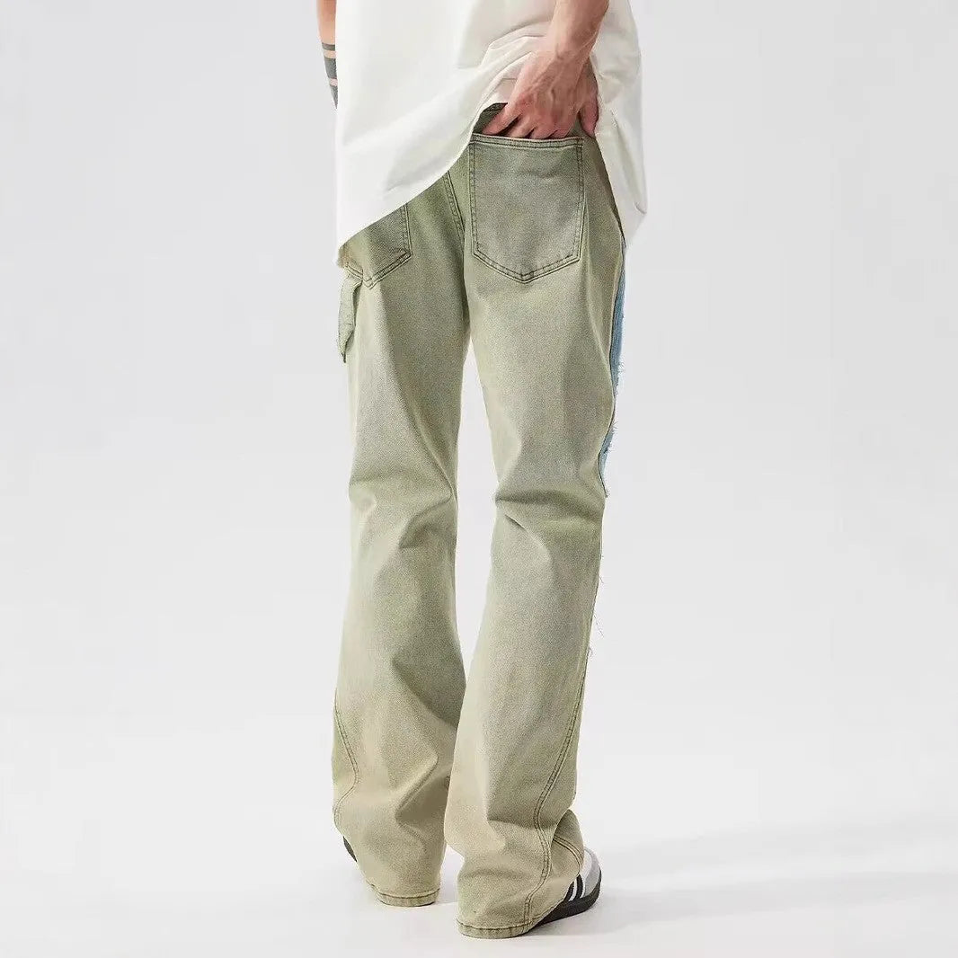 Retro yellow and blue patchwork jeans with splash-ink damaged design detail