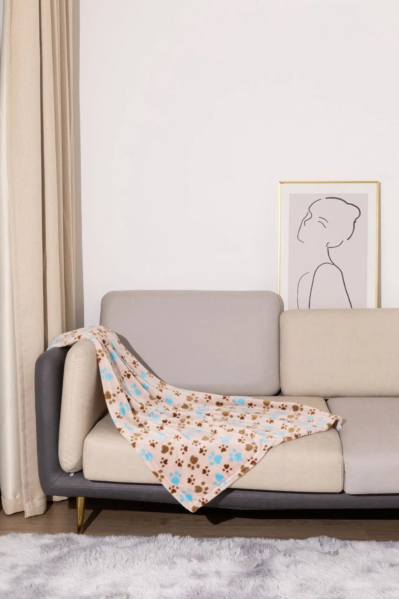 Blue dog cartoon pattern pet blanket laying flat, showing its double-sided thickened flannel texture.