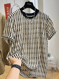 Men's black striped casual shirt with loose fit and short sleeves on hanger