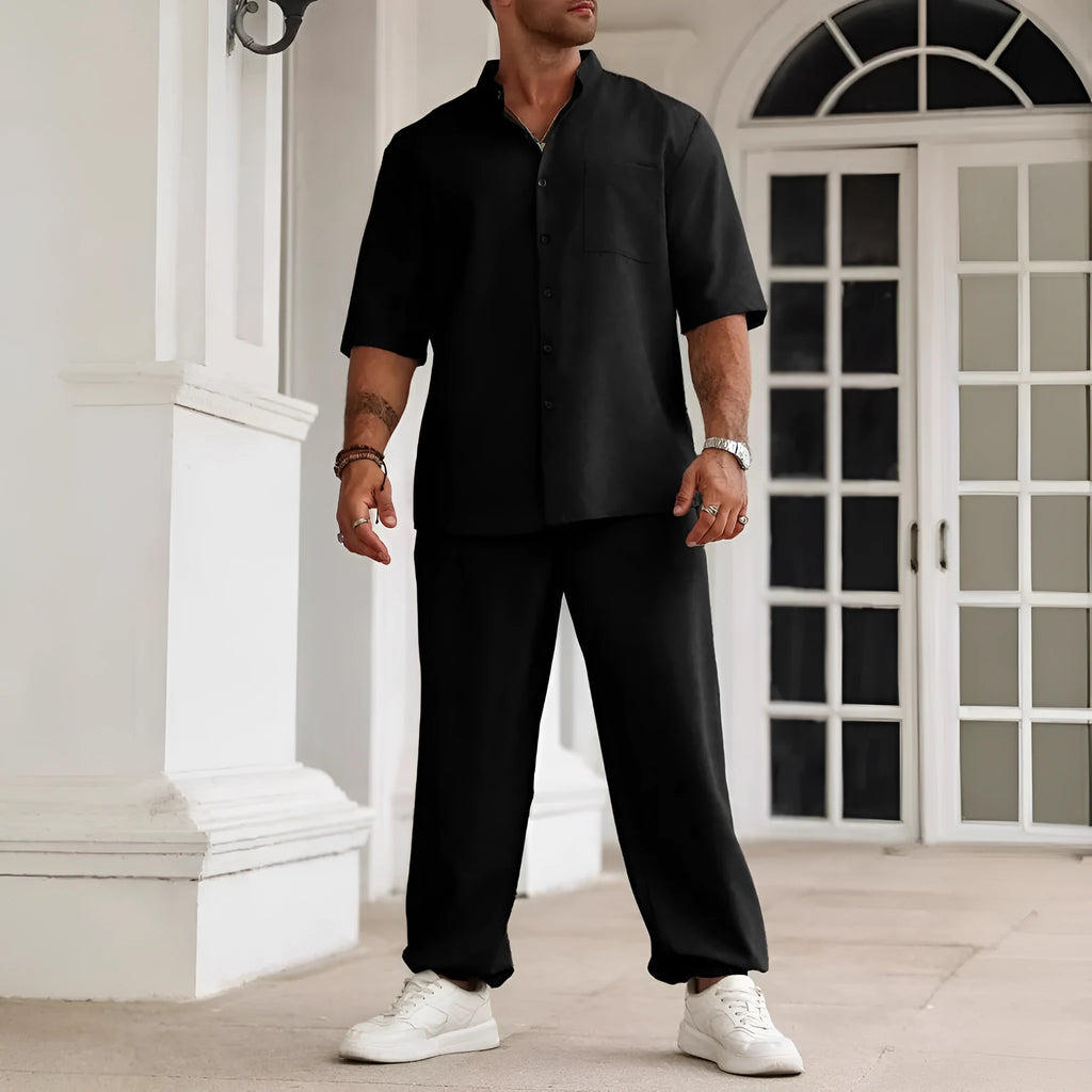 Men's apricot coloured cotton linen short sleeve shirt and trouser casual set laid flat.