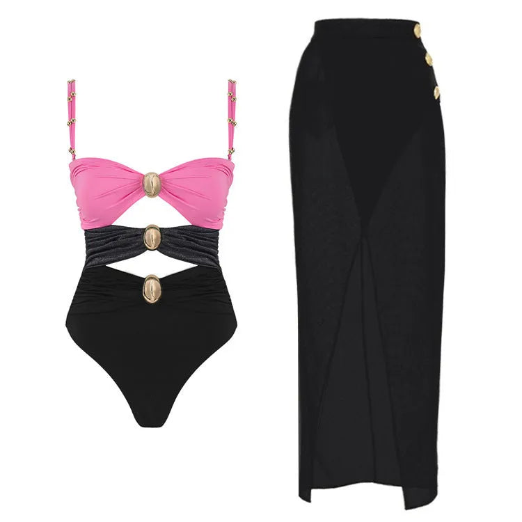 Women's solid colour one-piece swimsuit with matching skirt and gold button detailing