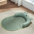 Green pet cooling mat for small dog in size L, 75 x 55cm, on a wooden floor